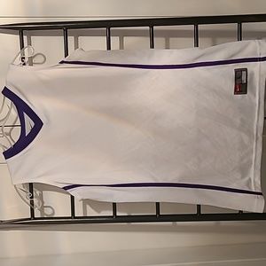NWOT never been worn Nike basketball jersey purple and white